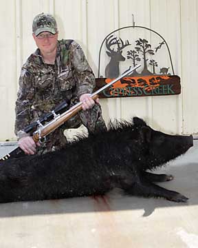 Jim with a Tiuan Plantation boar