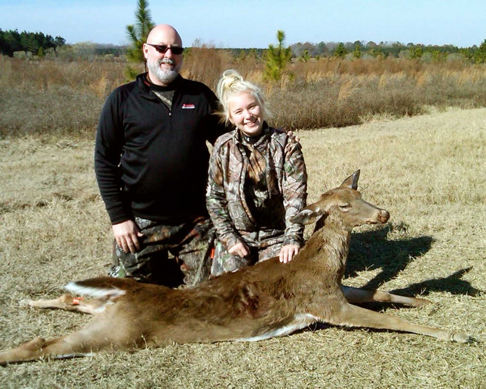 Scott and Shelby with their big doe