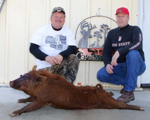 Mike with his red meat hog