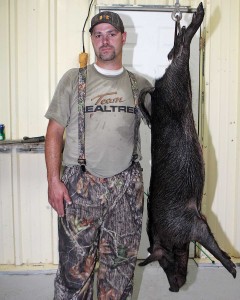 Joe putting pork in the freezer